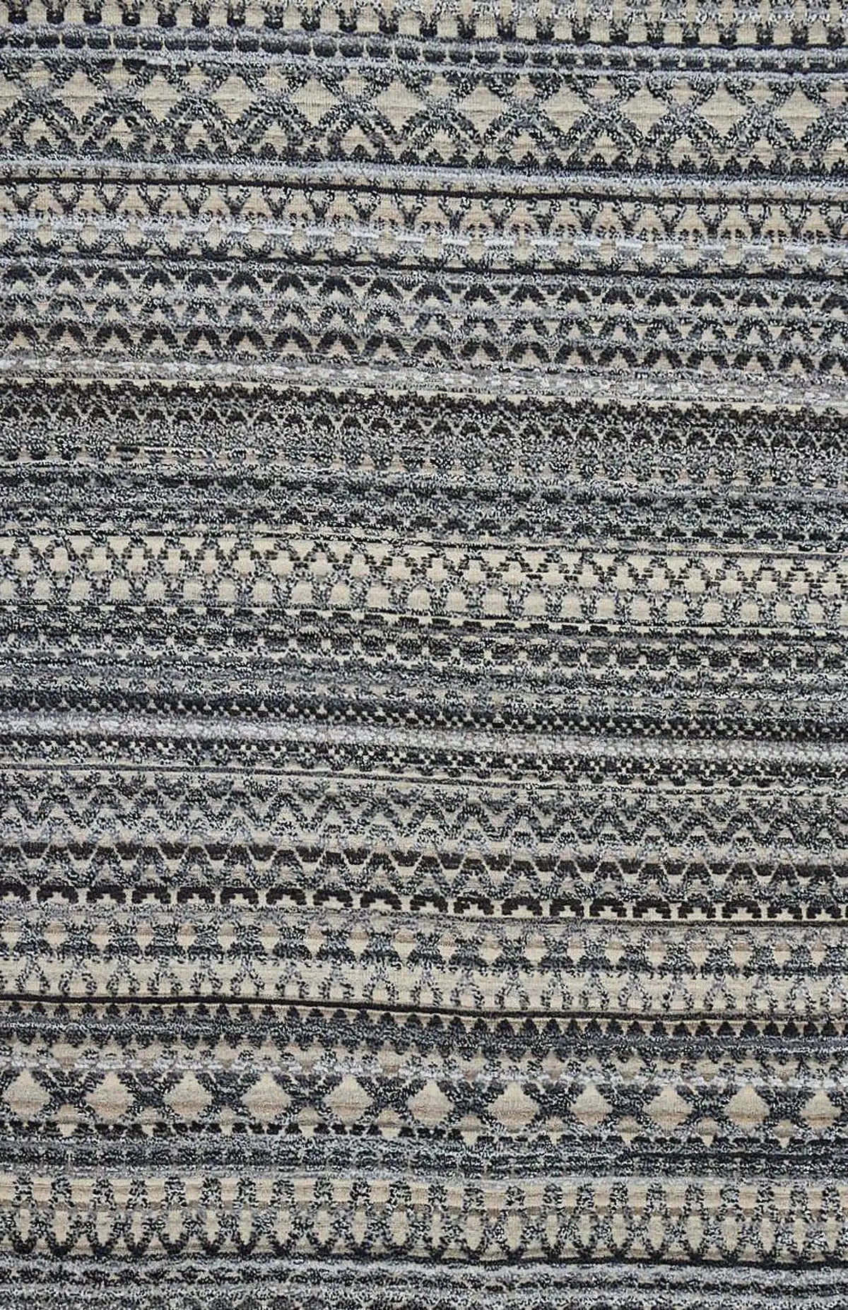 Brazil - Carbon is a Tribal Hand-Knotted Wool and Bamboo Silk Rug with a pile height of 7-9mm. Colours Dark Grey, Blues and Cream. Sizes 160 X 230, 200 X 290, and 240 X 340. Full.