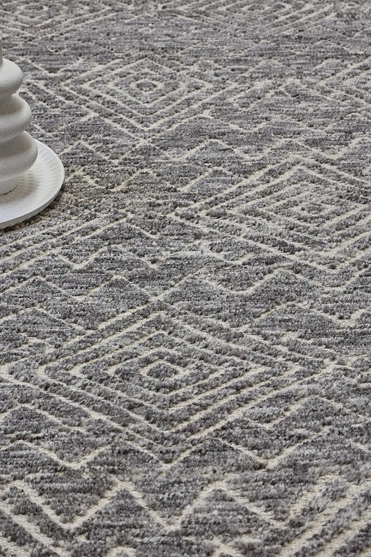 Brazil - Coca is a Boho Tribal Hand-Knotted Wool and Bamboo Silk Rug with a pile height of 7-9mm. Colours Grey with Cream. Sizes 160 X 230, 200 X 290, and 240 X 340. Life.