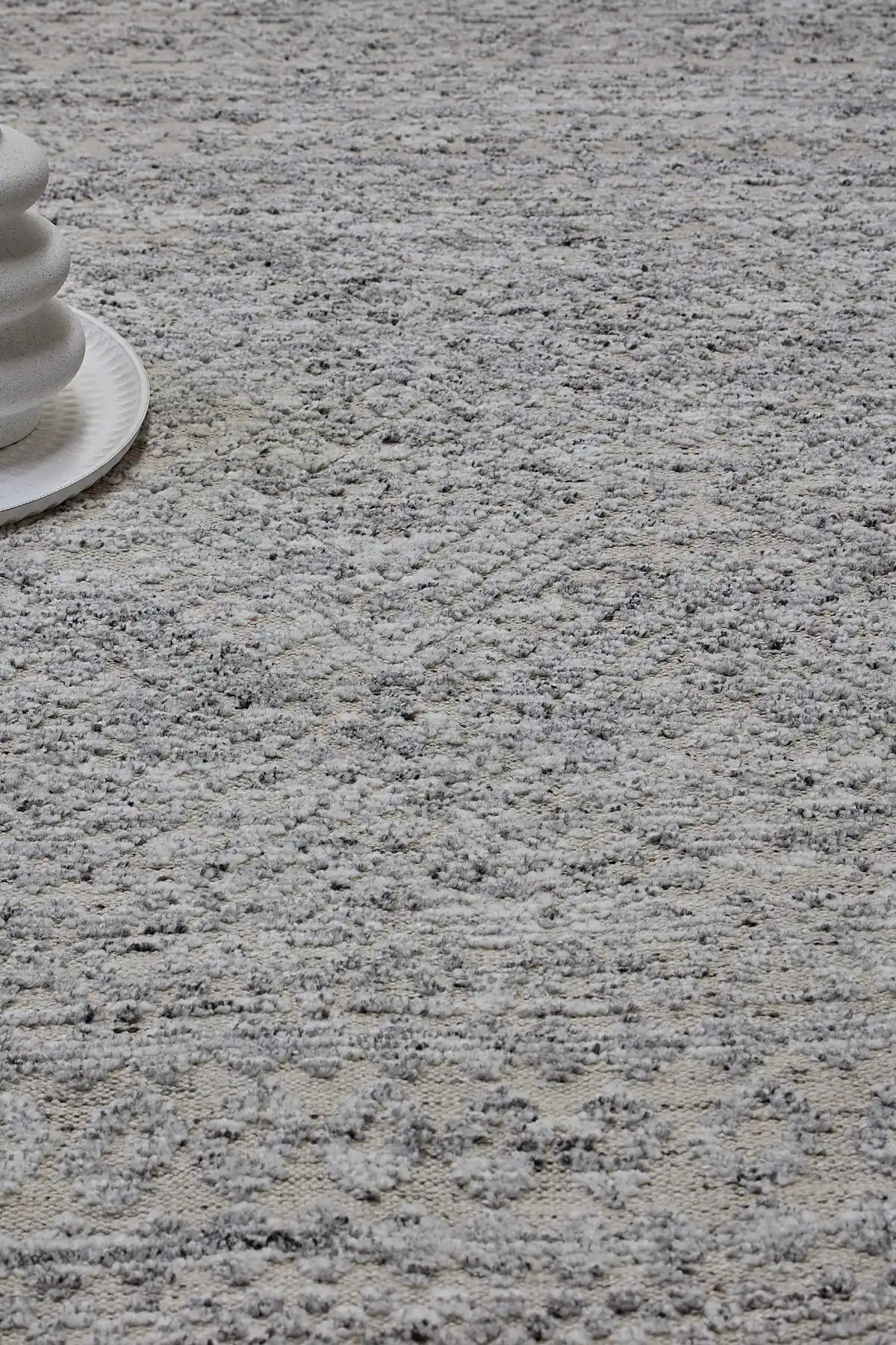 Brazil - Frost is a Boho Tribal Hand-Knotted Wool and Bamboo Silk Rug with a pile height of 7-9mm. Colours White with Light Grey and Dark Grey accents. Sizes 160 X 230, 200 X 290, and 240 X 340. Life.
