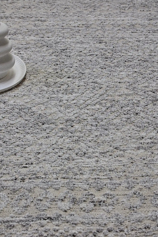 Brazil - Frost is a Boho Tribal Hand-Knotted Wool and Bamboo Silk Rug with a pile height of 7-9mm. Colours White with Light Grey and Dark Grey accents. Sizes 160 X 230, 200 X 290, and 240 X 340. Life.