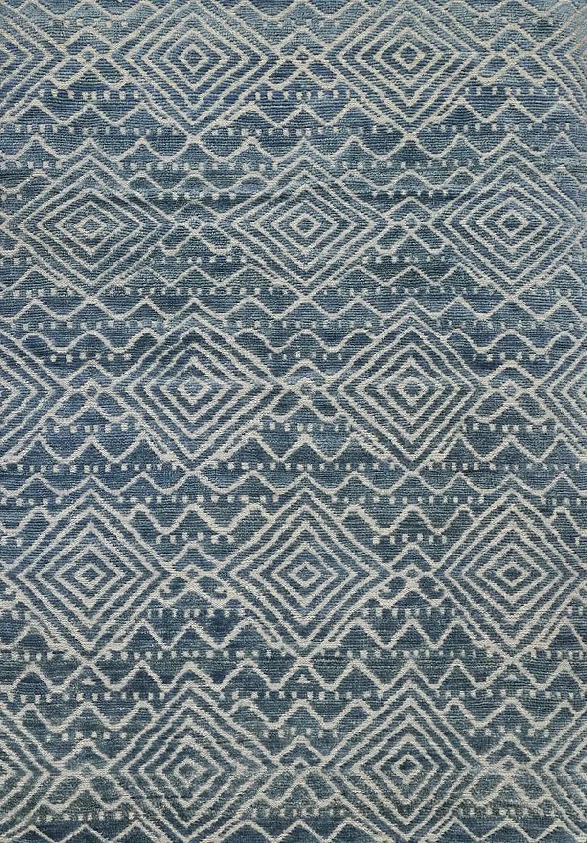 Brazil - Sky is a Boho Tribal Hand-Knotted Wool and Bamboo Silk Rug with a pile height of 7-9mm. Colours Blue with Light Grey accents. Sizes 160 X 230, 200 X 290, and 240 X 340. Full.