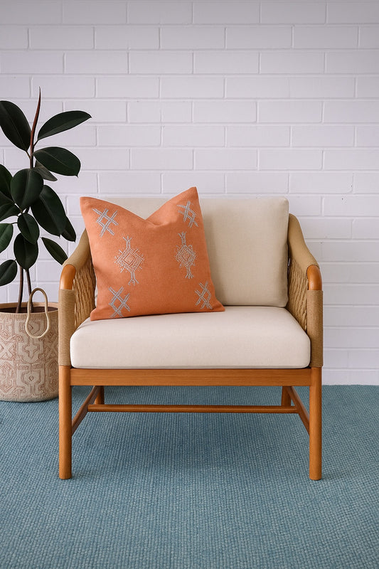 The Camellia Occasional Chair. Made with sustainable solid teak frame, with rope, and UV resistant cotton twill cushions. This occasional chair exudes style while providing comfort and durability. Measures 770 Wide X 800 Depth X 700 Back Height - 470 Seat Height. Styled.