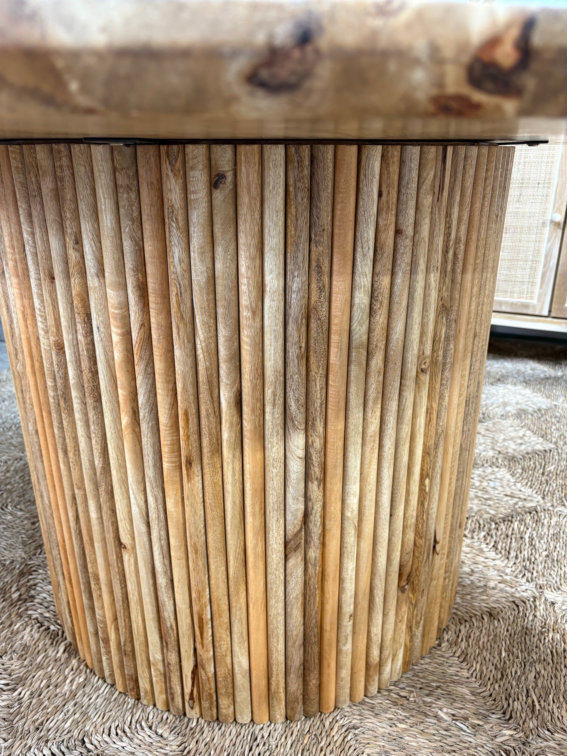 The Charles 1350 Dining Table is a contemporary round dining table. Featuring a sustainable Fruitwood top and slated column fruitwood base. Colour natural. Measures 1350 diameter X 760 height. Base.