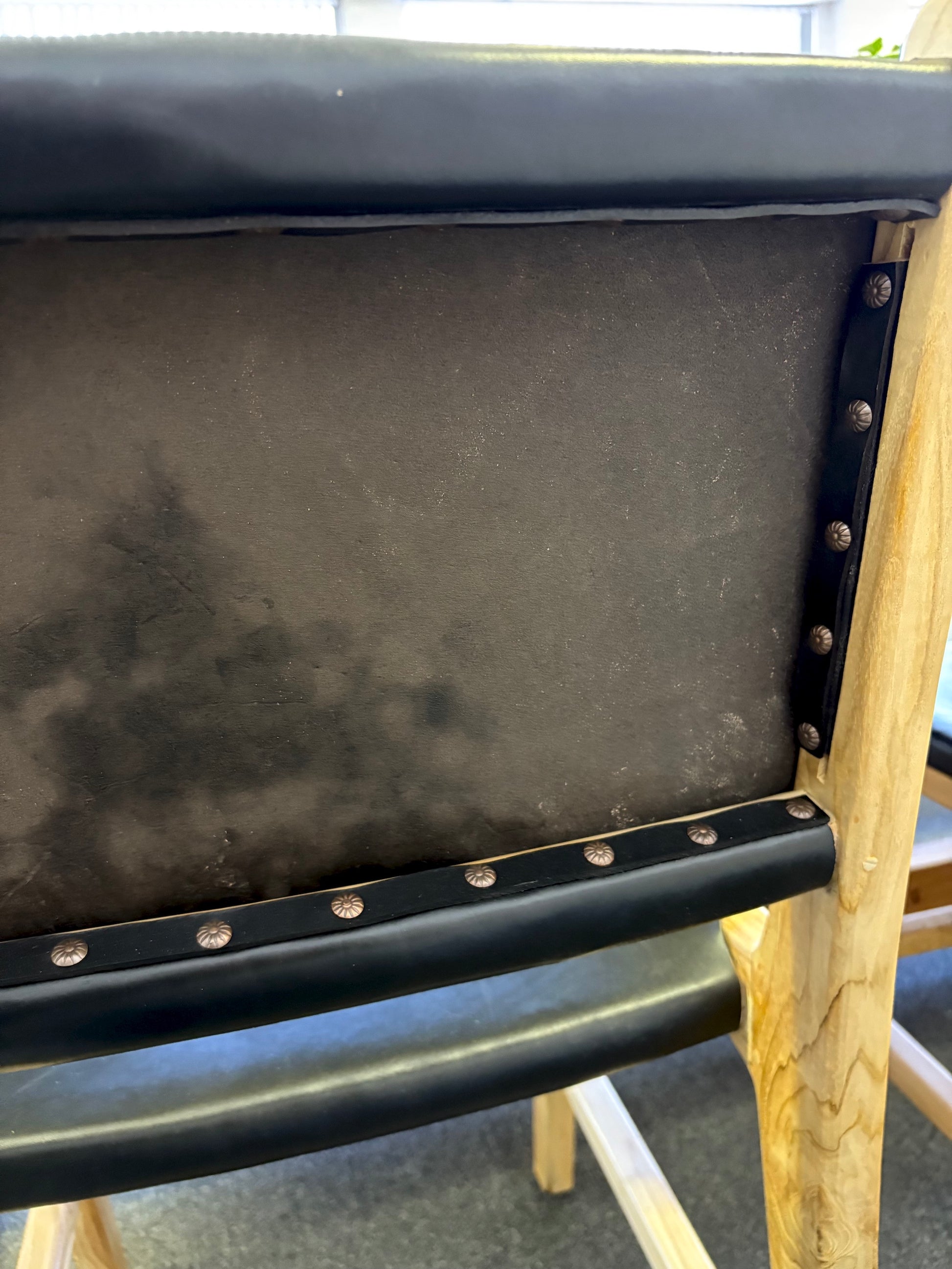 The Cherokee - Black Dining Chair is crafted from solid teak with a smooth black leather seat and back. Colours natural frame with black seat and back. Measures 560 Depth x 450 Wide x 500 Seat Height. Back height 820. Back Close.