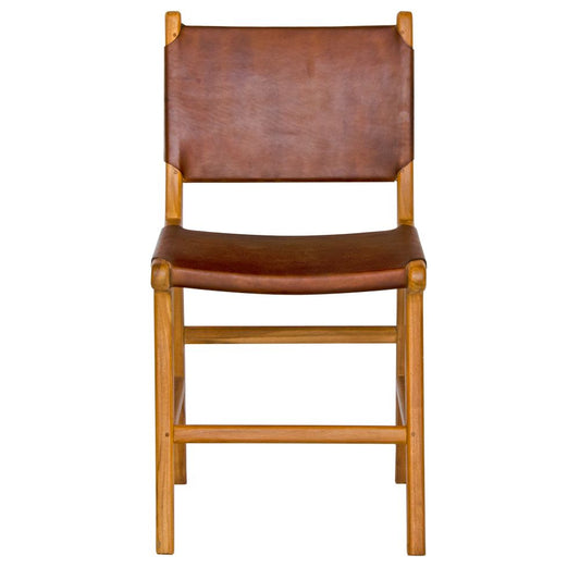 The Cherokee - Brown Dining Chair is crafted from solid teak with a smooth Brown leather seat and back. Colours natural frame with Brown seat and back. Measures 560 Depth x 450 Wide x 500 Seat Height. Back height 820. Front Plain.