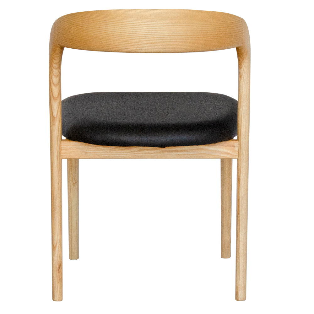 The Cheyenne Natural and Black dining chair features a modern style and design. Crafted with a solid ash frame and a smooth padded black polyurethane seat. Colour Natural Frame with Black seat. Measures 500 wide X 520 depth X 460 Seat height. Back height 750. Back.