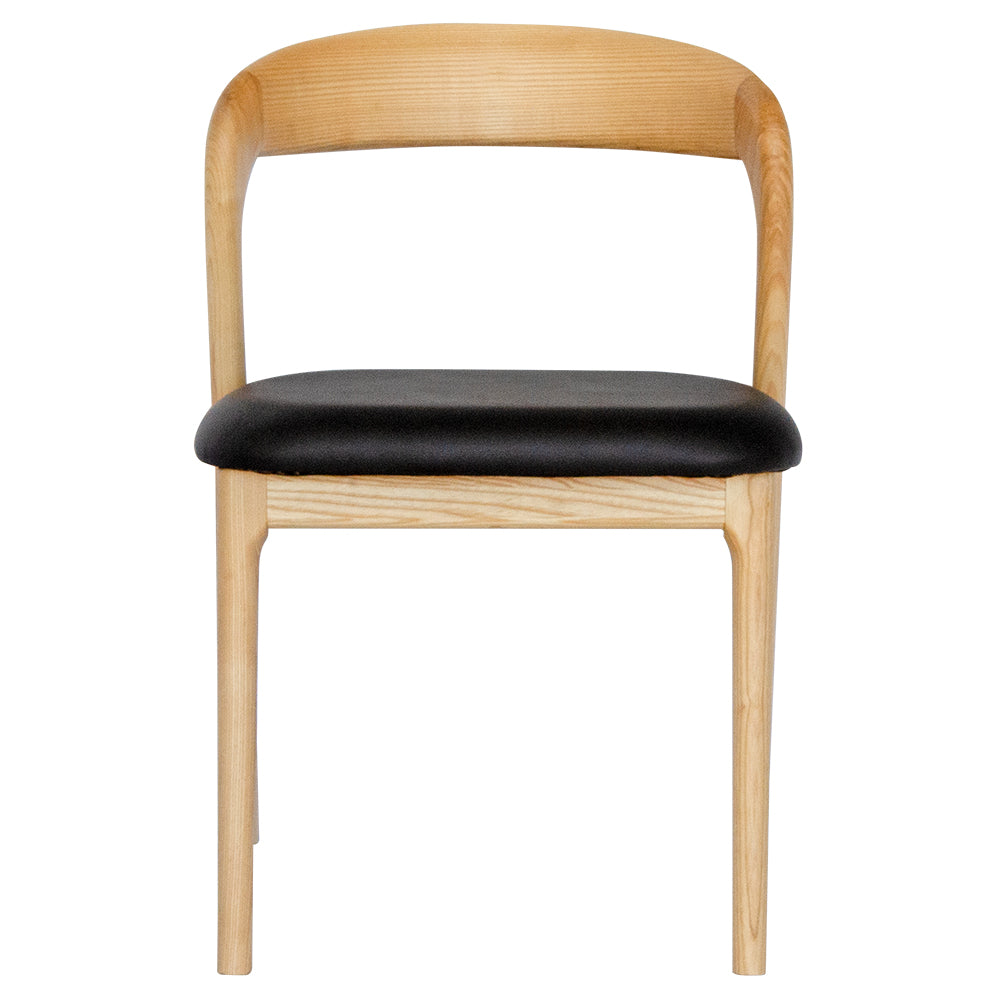 The Cheyenne Natural and Black dining chair features a modern style and design. Crafted with a solid ash frame and a smooth padded black polyurethane seat. Colour Natural Frame with Black seat. Measures 500 wide X 520 depth X 460 Seat height. Back height 750. Front Plain.