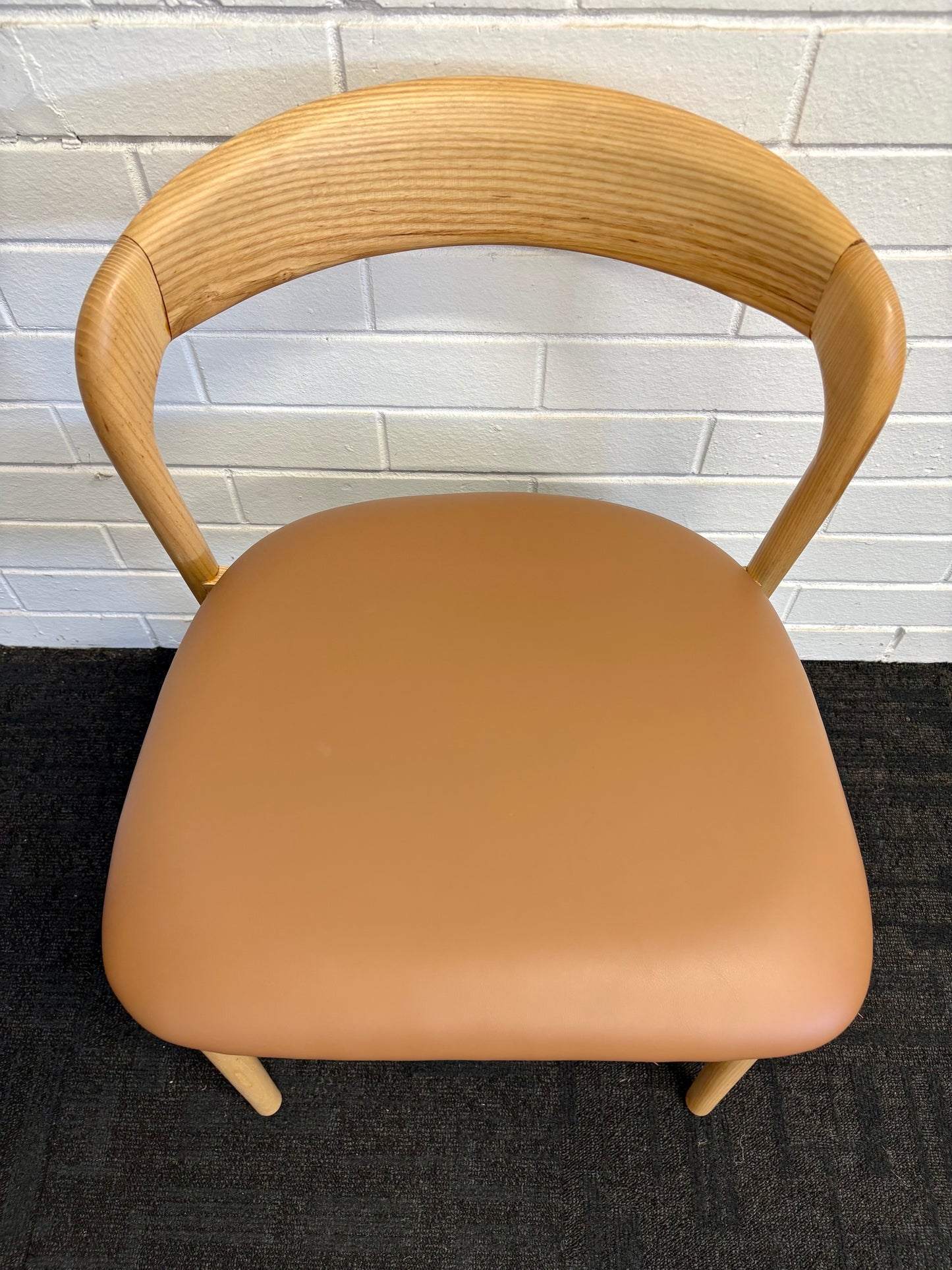 The Cheyenne Natural and Tan dining chair features a modern style and design. Crafted with a solid ash frame and a smooth padded tan polyurethane seat. Colour Natural Frame with Tan seat. Measures 500 wide X 520 depth X 460 Seat height. Back height 750. Top.