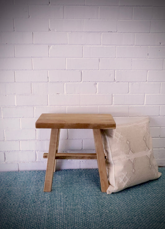 Chitose Rectangle Foot Stool. Handcrafted from durable, reclaimed teak, it adds a touch of rustic charm to any space and is built to last. Measures   500 Wide X 250 Depth X 450 Height. Styled.