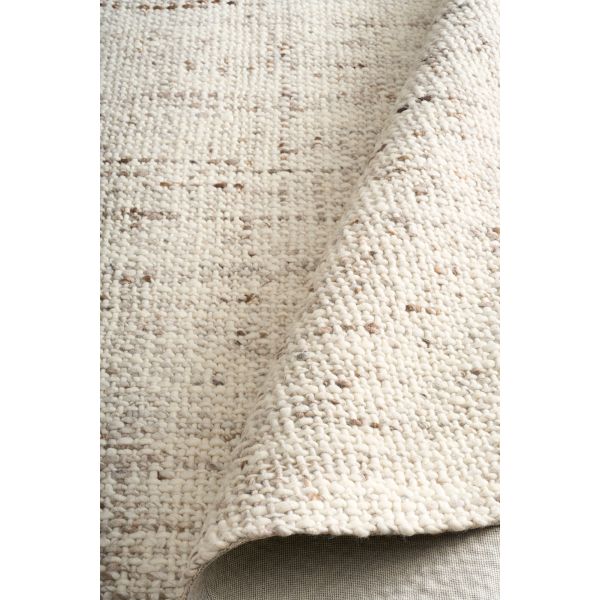 Cleo Beige hand-woven wool flatweave rug in an oatmeal neutral, with a flecked, cross-woven texture and flat woven border. 3 Sizes. Roll view.