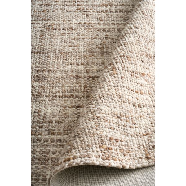 Cleo Brown hand-woven wool flatweave rug in a warm rust tone, with a flecked, cross-woven texture and flat woven border. 3 sizes. Roll view.