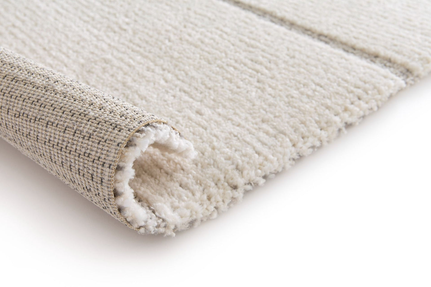 Cocoon - Light Grey, a modern rug design crafted with a unique blend of Heat Set Polypropylene and Polyester shrink yarn. Roll.