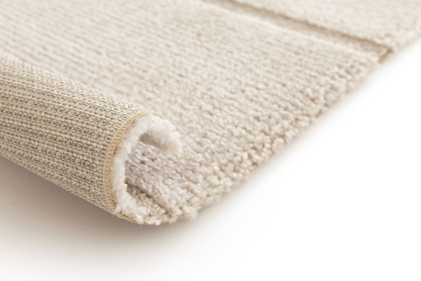 Cocoon - Beige, a modern rug design crafted with a unique blend of Heat Set Polypropylene and Polyester shrink yarn. Roll.
