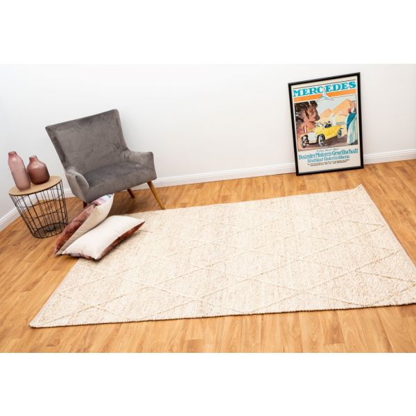 Colombo Beige is a textured hand woven rug. Made from 80% wool and 20% polyester, it features a braided diamond pattern for an extra textured feel.  Colour Beige.  Sizes 155 X 225, 200 X 290, 240 X 320 and 300 X 400. Life.