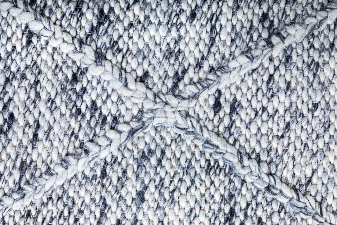 Colombo Grey is a textured hand woven rug. Made from 80% wool and 20% polyester, it features a braided diamond pattern for an extra textured feel.  Colour Bluish Grey and White.  Sizes 155 X 225, 200 X 290, 240 X 320 and 300 X 400. Close.