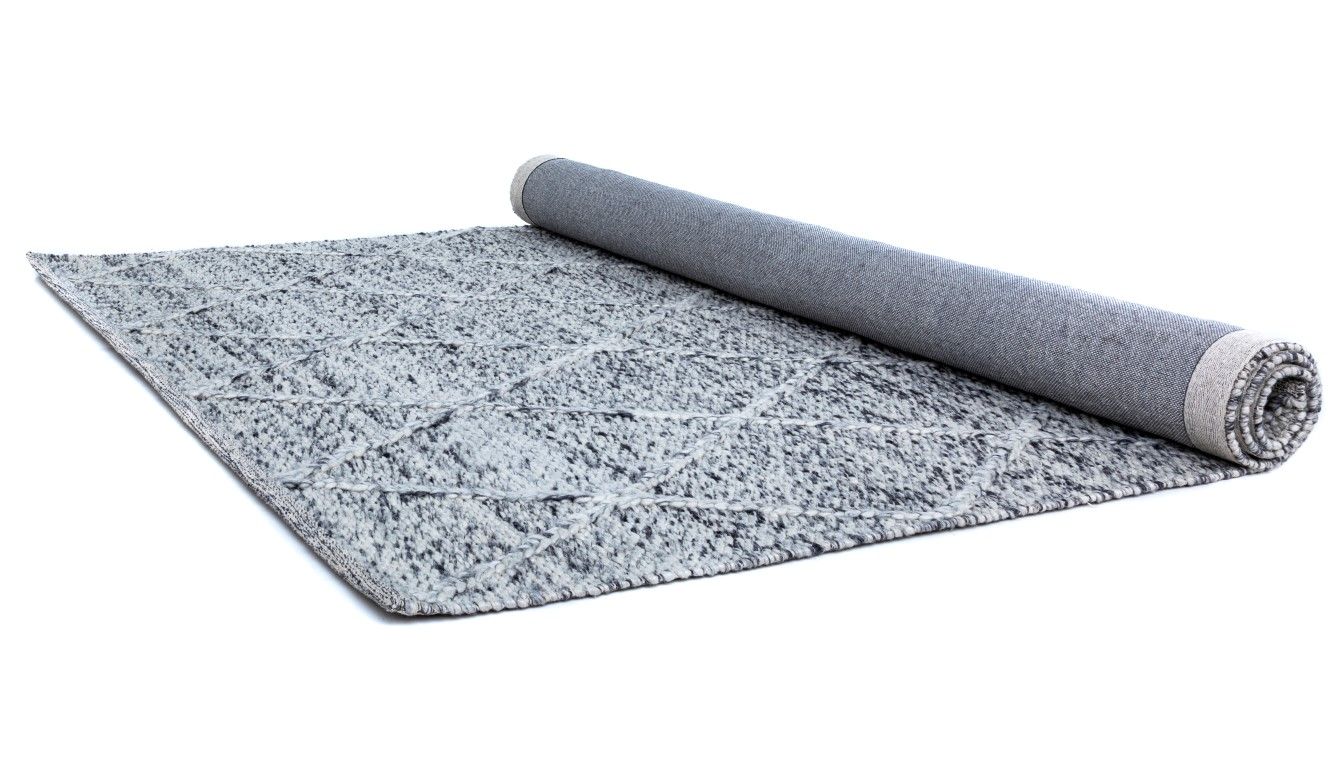 Colombo Grey is a textured hand woven rug. Made from 80% wool and 20% polyester, it features a braided diamond pattern for an extra textured feel.  Colour Bluish Grey and White.  Sizes 155 X 225, 200 X 290, 240 X 320 and 300 X 400. Half Roll.