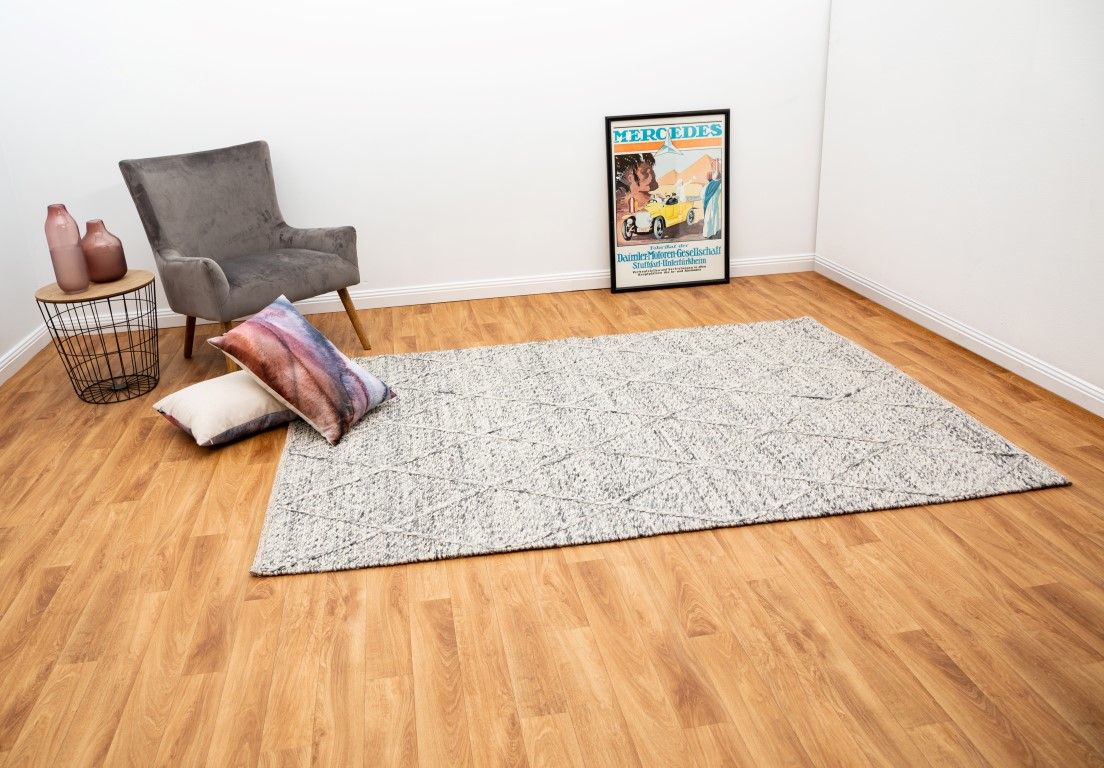 Colombo Grey is a textured hand woven rug. Made from 80% wool and 20% polyester, it features a braided diamond pattern for an extra textured feel.  Colour Bluish Grey and White.  Sizes 155 X 225, 200 X 290, 240 X 320 and 300 X 400. Life.