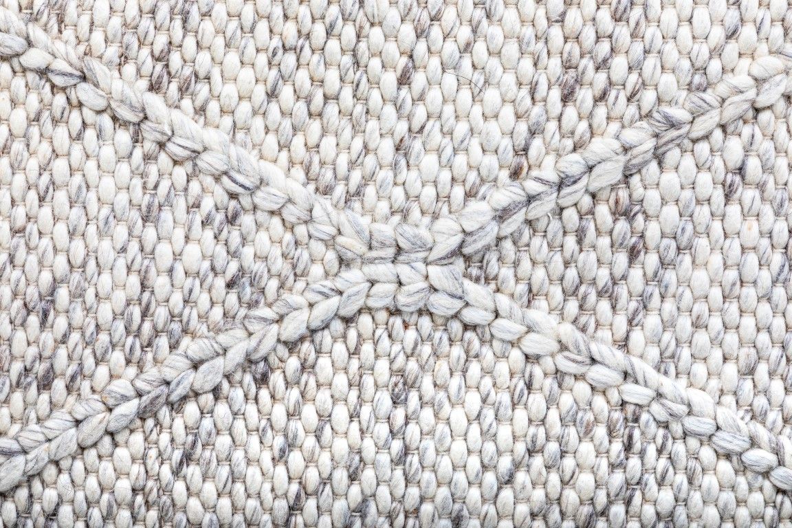 Colombo Light Grey is a textured hand woven rug. Made from 80% wool and 20% polyester, it features a braided diamond pattern for an extra textured feel.  Colour Light Grey.  Sizes 155 X 225, 200 X 290, 240 X 320 and 300 X 400. Close.