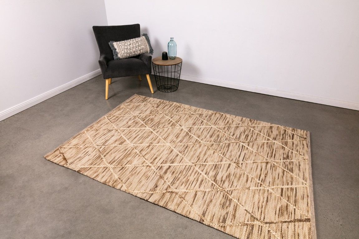 Colombo Natural is a textured hand woven rug. Made from 80% wool and 20% polyester, it features a braided diamond pattern for an extra textured feel.  Colour Creamy Beige with Brown accents.  Sizes 155 X 225, 200 X 290, 240 X 320 and 300 X 400. Life.