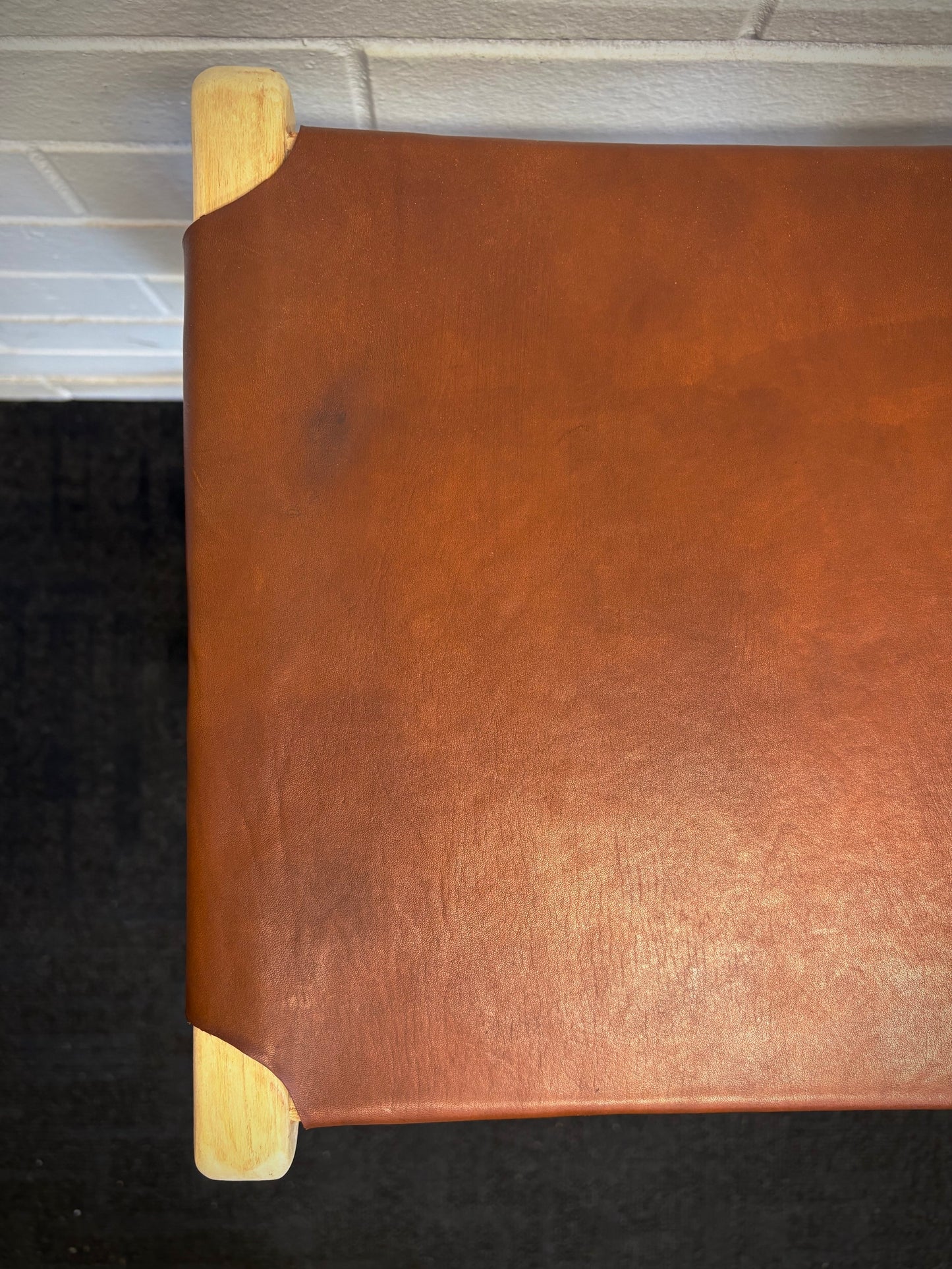 The Columbia - Brown Leather barstool features a lush leather seat and sustainable teak framed legs. Colour natural teak frame with brown leather seat. Measures 400 wide X 400 depth X 650 Seat height. Top.