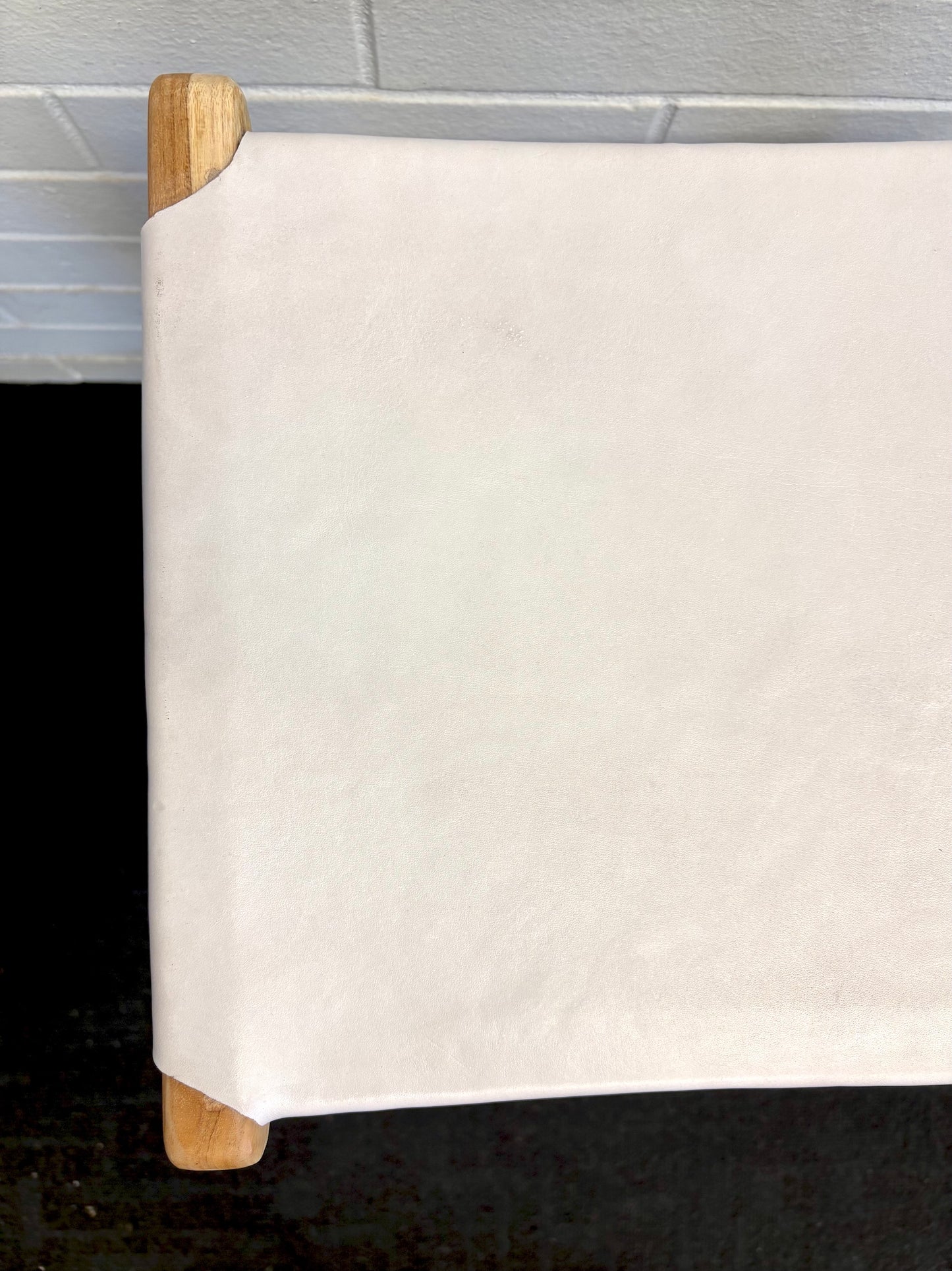 The Columbia - White Leather barstool features a lush leather seat and sustainable teak framed legs. Colour natural teak frame with white seat. Measures 400 wide X 400 depth X 650 Seat height. Top.