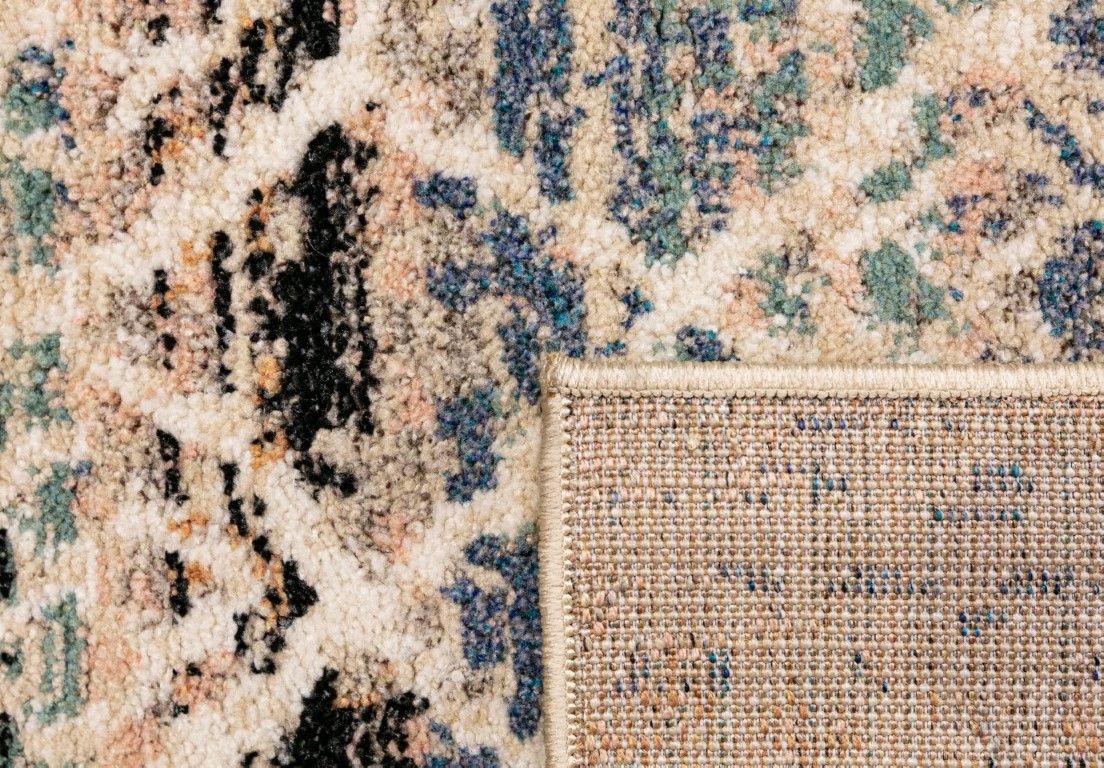 Cozy 5422 Blue Beige is a tribal designed machine made rug. Constructed from luxurious polyester yarn, it features a soft feel.  Colours Beige with Cream, Blue and Black patterns. Size 160 X 230. Fold.