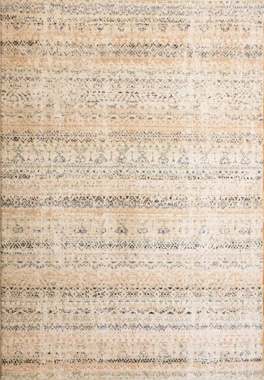 Cozy 5426 Ivory Beige is a tribal patterned designed machine made rug. Constructed from luxurious polyester yarn, it features a soft feel.  Colours Beige with Cream, Blue and Black Tribal Patterns. Size 160 X 230, 200 X 290 and 300 X 400. Full.