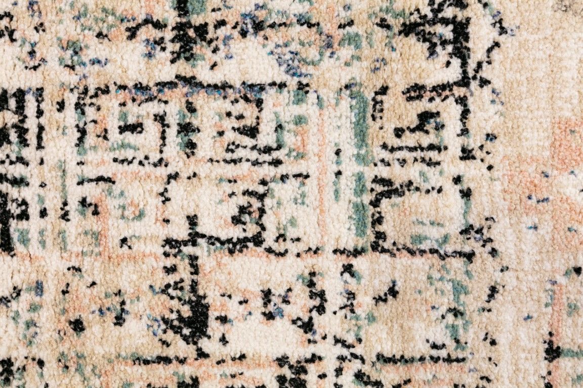 Cozy 5434 Ivory Beige is a tribal patterned designed machine made rug. Constructed from luxurious polyester yarn, it features a soft feel.  Colours  Ivory Beige with Cream, Black and Blue Tribal Patterns. Size 160 X 230 and 200 X 290. Close.