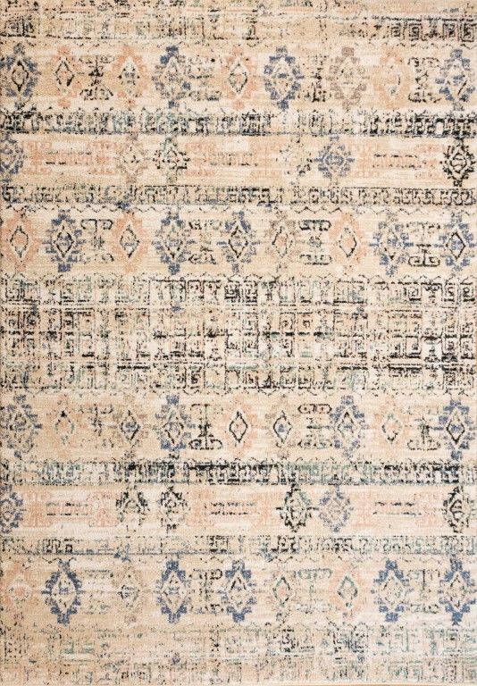 Cozy 5434 Ivory Beige is a tribal patterned designed machine made rug. Constructed from luxurious polyester yarn, it features a soft feel.  Colours  Ivory Beige with Cream, Black and Blue Tribal Patterns. Size 160 X 230 and 200 X 290. Full.