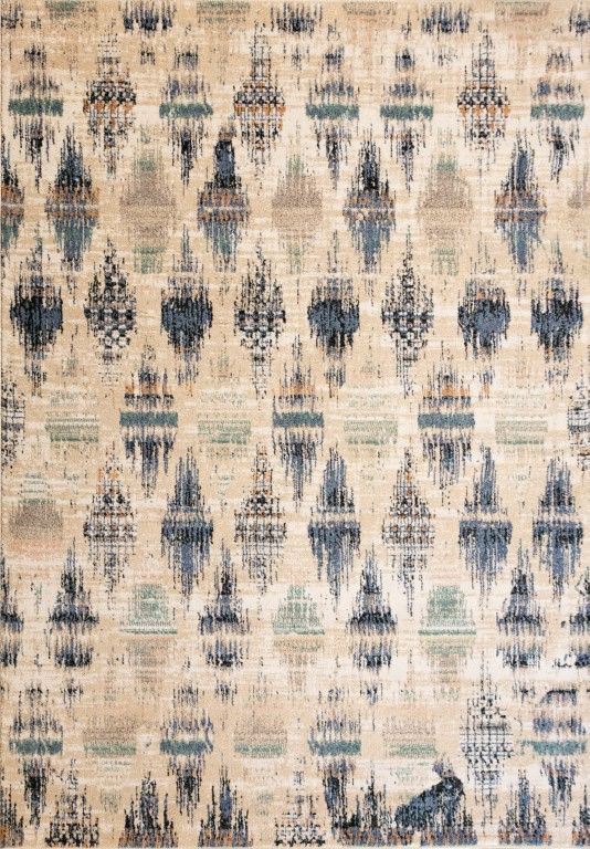 Cozy 5439 Blue Beige is a tribal diamond patterned designed machine made rug. Constructed from luxurious polyester yarn, it features a soft feel.  Colours Beige with Cream, Blue and Black Diamond Patterns. Sizes  160 X 230 and 200 X 290 and 300 X 400. Full.