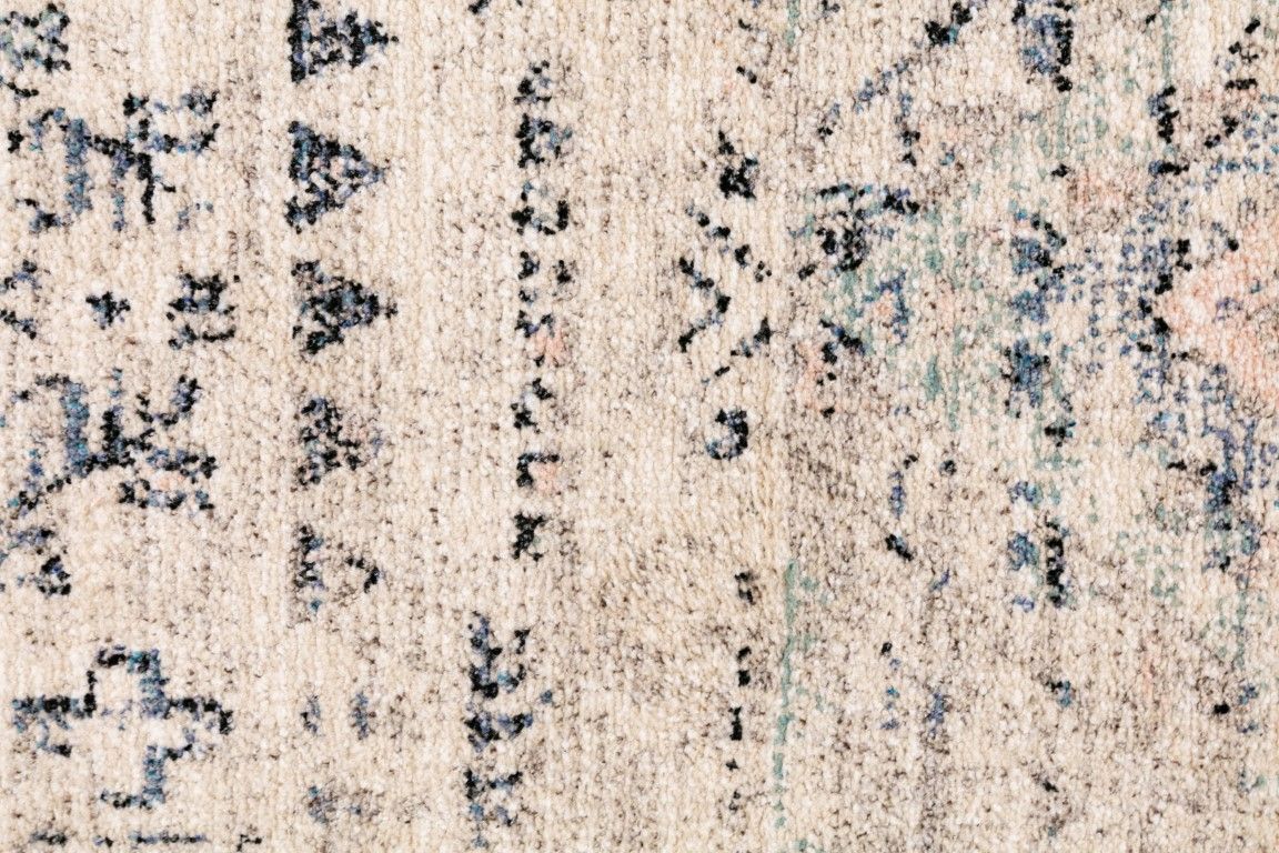 Cozy 5443 Dark Beige is a tribal diamond patterned designed machine made rug. Constructed from luxurious polyester yarn, it features a soft feel.  Colours Beige with Cream, Blue and Black  Tribal Diamond Patterns. Sizes 160 X 230 and 300 X 400. Close.