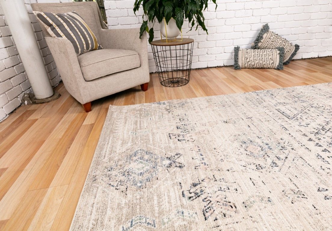 Cozy 5443 Dark Beige is a tribal diamond patterned designed machine made rug. Constructed from luxurious polyester yarn, it features a soft feel.  Colours Beige with Cream, Blue and Black  Tribal Diamond Patterns. Sizes 160 X 230 and 300 X 400. Life.