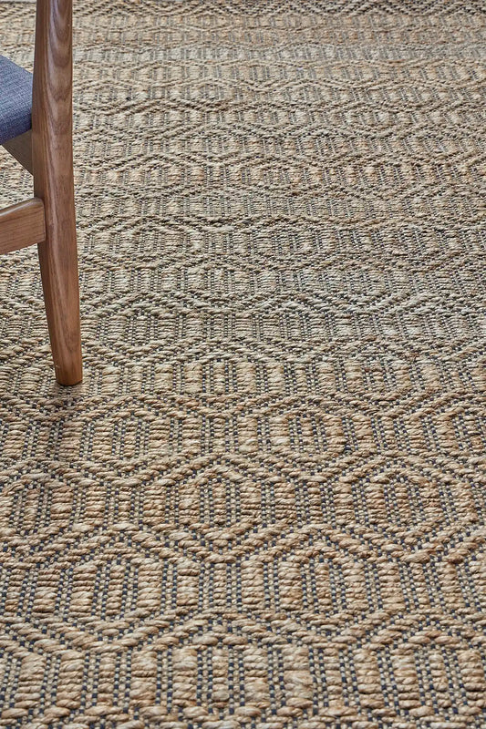 Daintree - Nevada is a rug made with panja hand woven natural coloured jute. Features a 7-9mm pile height and geometic design. Colour Natural with Black. Sizes 160 X 230, 200 X 290 and 240 X 340. Life.