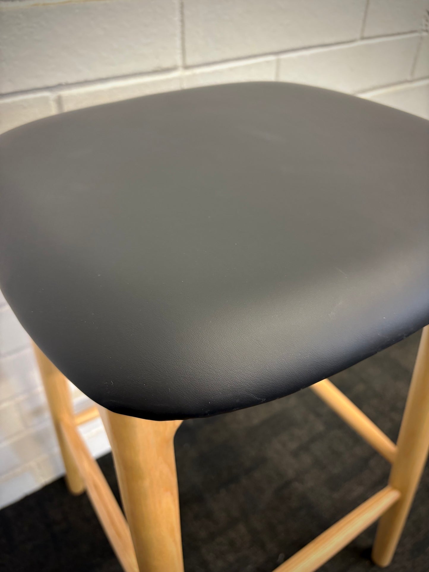 The Danube - Natural Black Barstool. A contemporary style barstool. Solid natural ash frame with black polyurethane seat. Measures  400W X 400D X 670 Seat Height. Close.