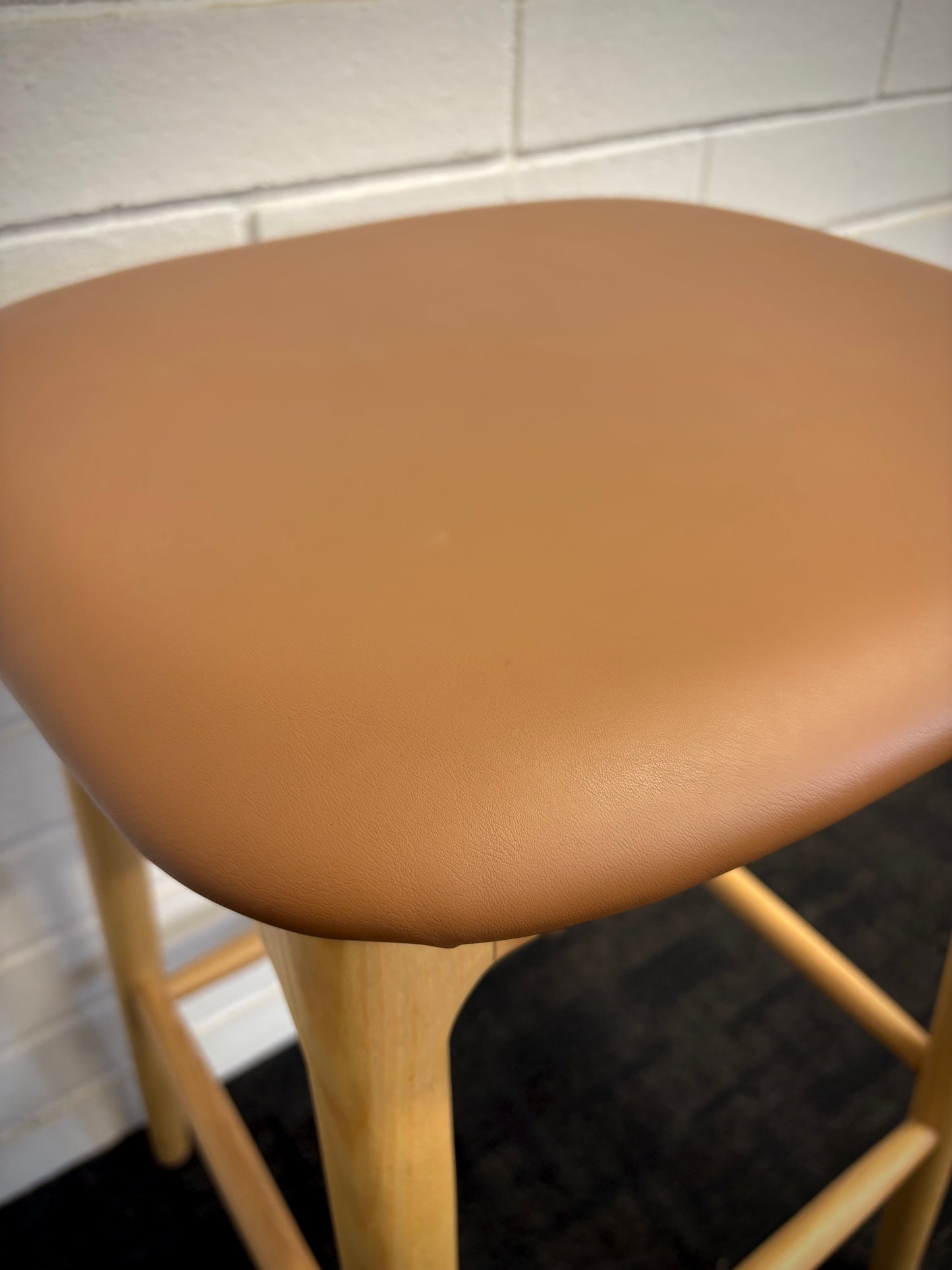 The Danube - Natural/Tan Barstool. A contemporary style barstool. Solid natural ash frame with tan polyurethane seat. Measures  400W X 400D X 670 Seat Height. Close.