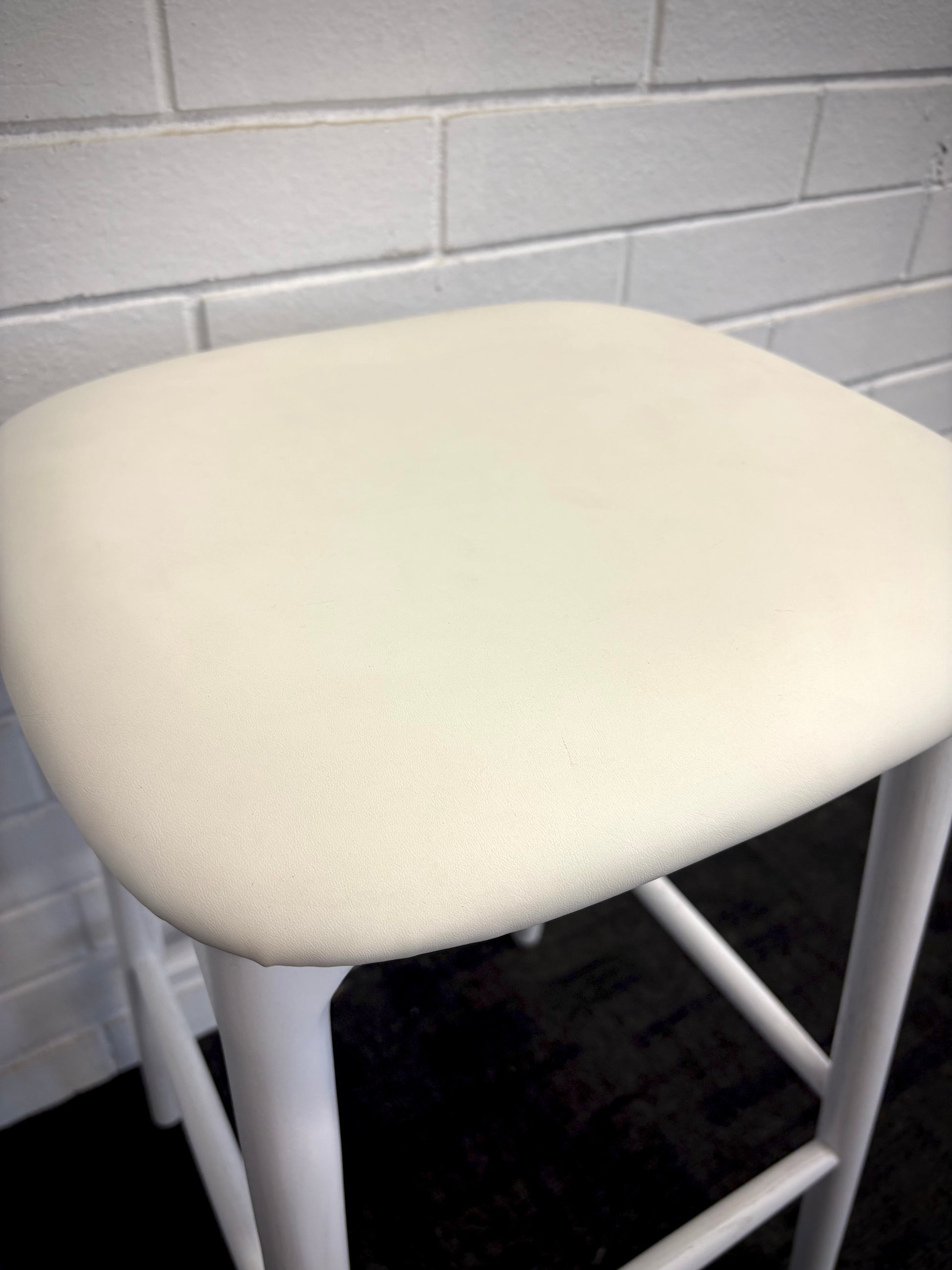 The Danube - White Barstool. A contemporary style barstool. Solid natural ash frame with tan polyurethane seat. Measures  400W X 400D X 670 Seat Height. Close.