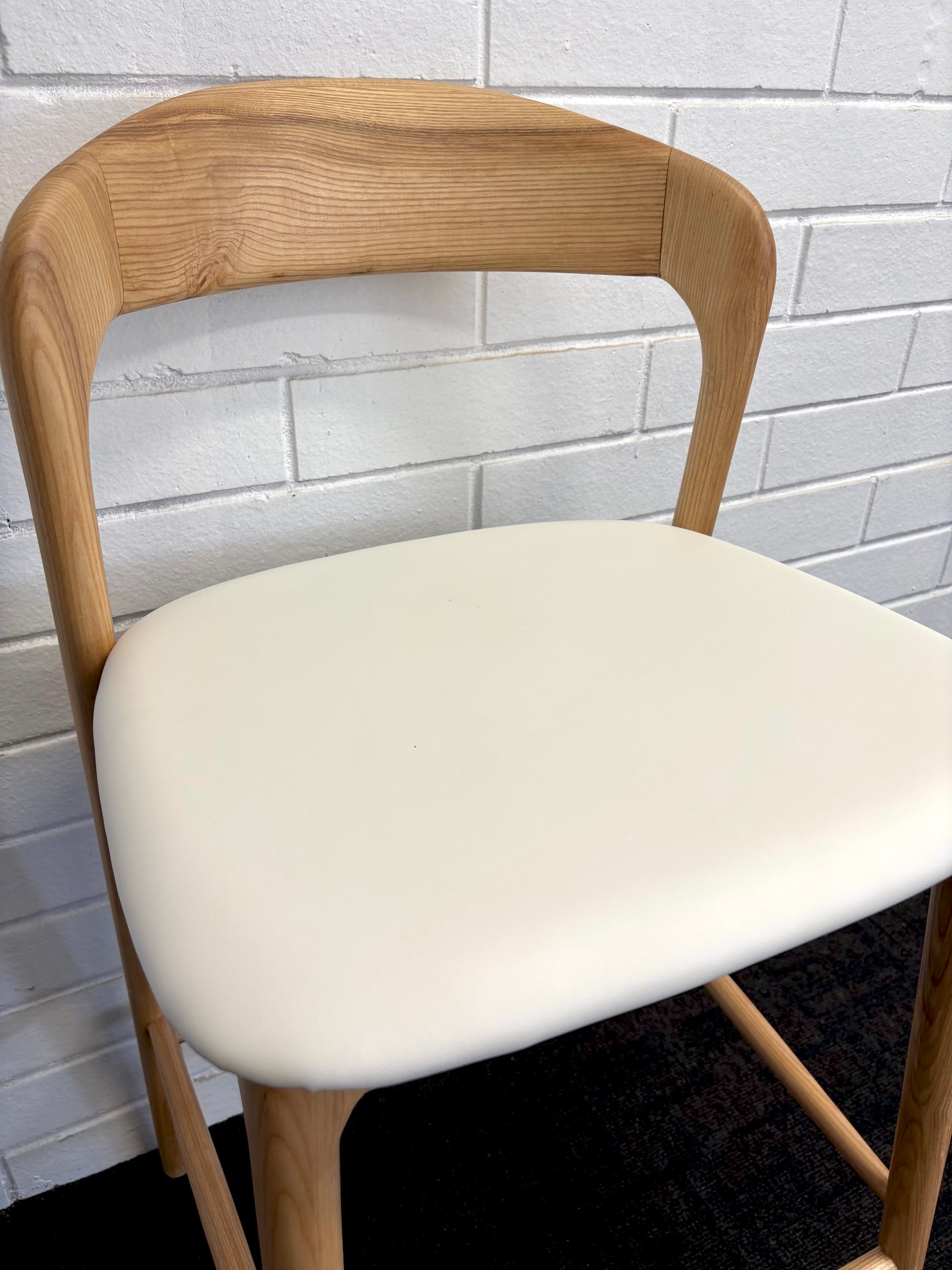 The Danube with Back - Natural White Barstool. A contemporary style barstool. Solid natural ash frame with white polyurethane seat. Measures  470W X 450D X 670 Seat Height. Back Height 920. Close.