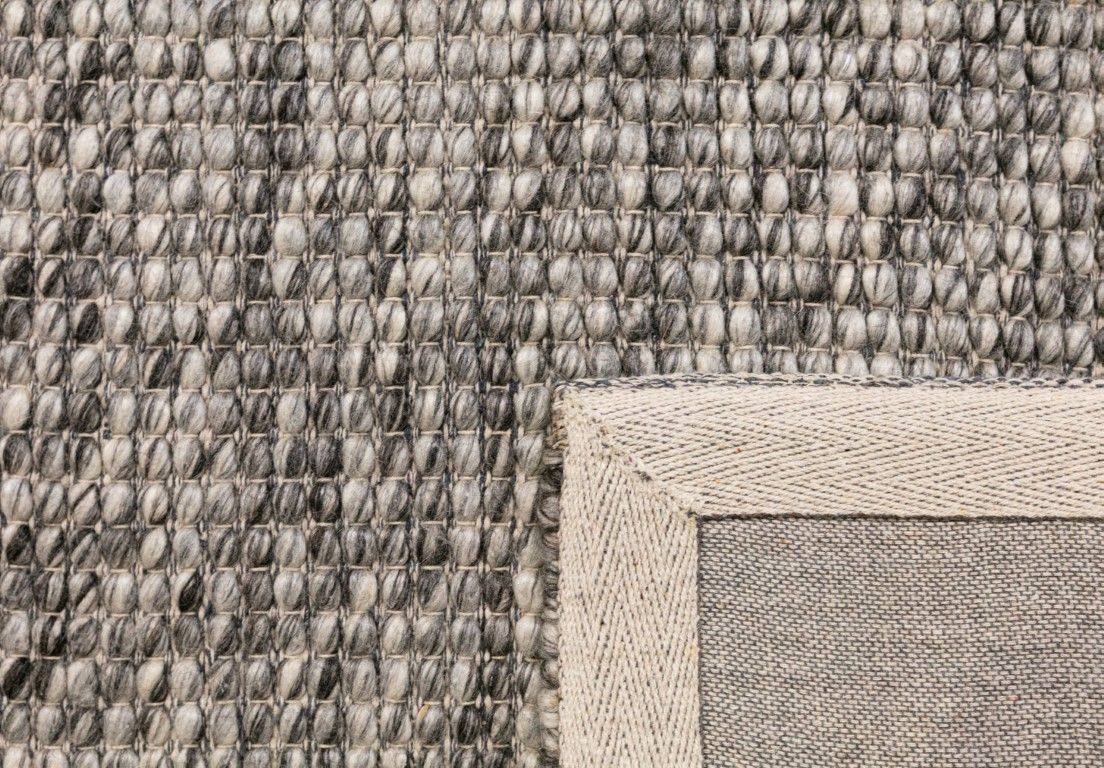 Dasha Dark Grey is a texture hand woven rug made of 80%  New Zealand Wool and 20% Polyester. Colour Dark Grey. Sizes 155 X 225, 200 X 290, 240 X 320 and 300 X 400. Fold.