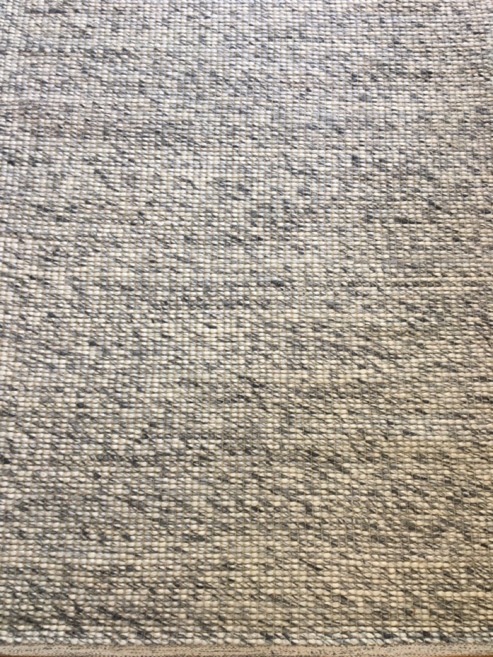 Dasha Grey is a texture hand woven rug made of 80%  New Zealand Wool and 20% Polyester. Colour Grey. Sizes 155 X 225, 200 X 290, 240 X 320 and 300 X 400. Full.