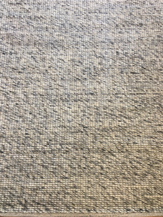 Dasha Grey is a texture hand woven rug made of 80%  New Zealand Wool and 20% Polyester. Colour Grey. Sizes 155 X 225, 200 X 290, 240 X 320 and 300 X 400. Full.