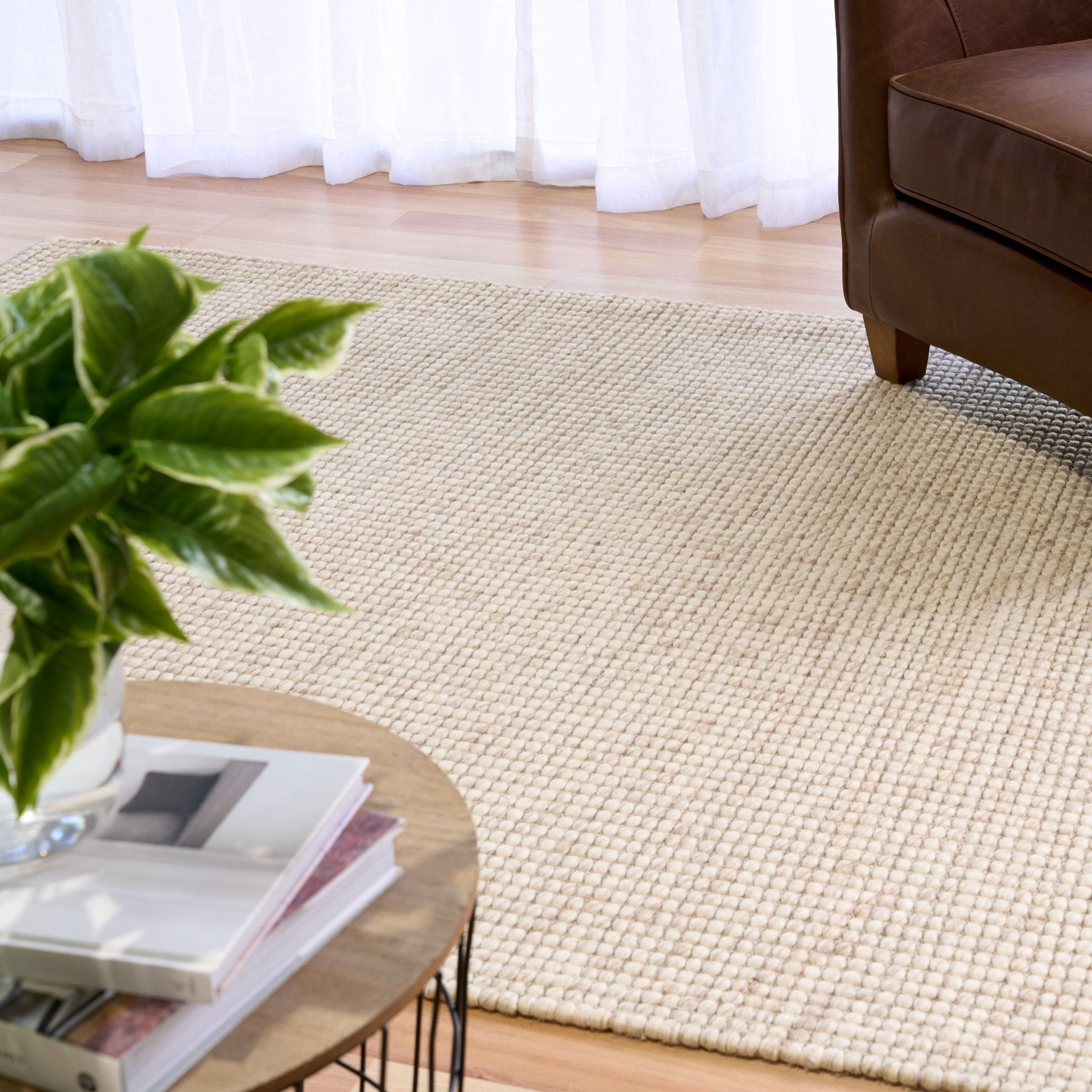 Dasha Beige is a texture hand woven rug made of 80%  New Zealand Wool and 20% Polyester. Colour Beige. Sizes 155 X 225, 200 X 290, 240 X 320 and 300 X 400. Life.