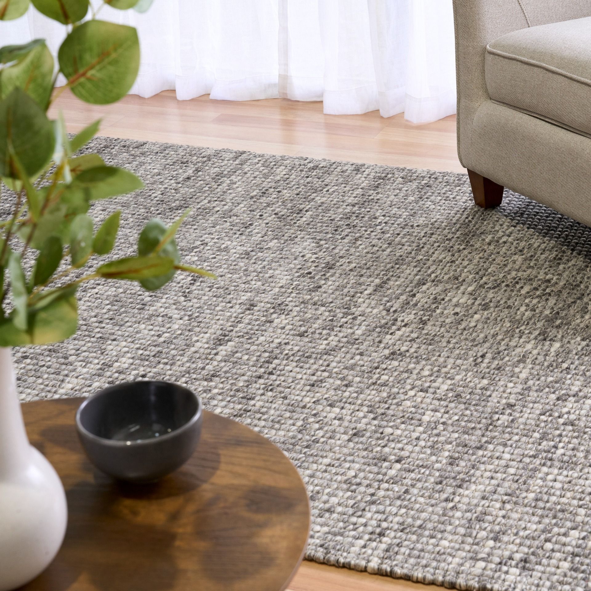 Dasha Dark Grey is a texture hand woven rug made of 80%  New Zealand Wool and 20% Polyester. Colour Dark Grey. Sizes 155 X 225, 200 X 290, 240 X 320 and 300 X 400. Life.