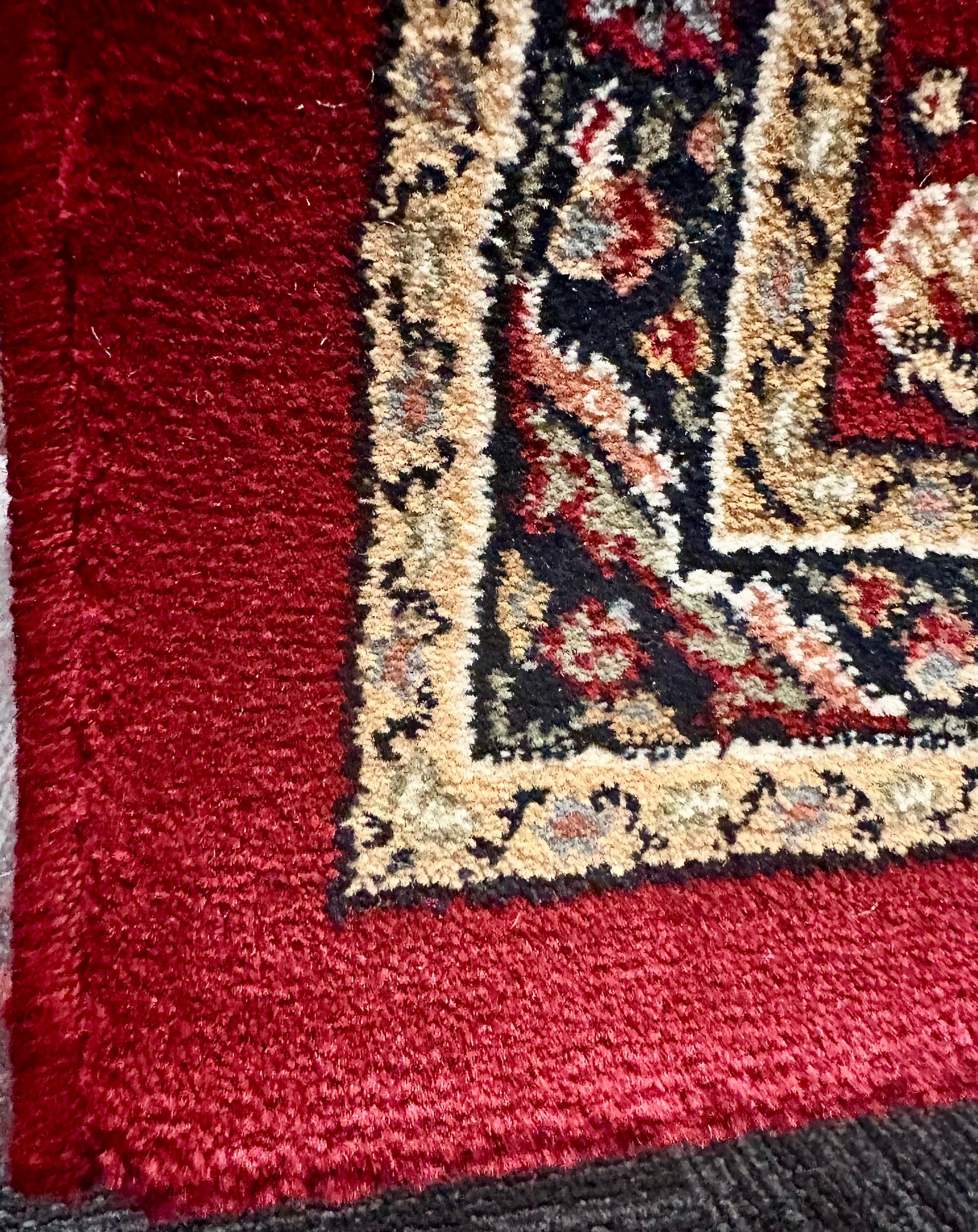 The Davinci Bakhtiari Dark Persian Rug. Machine made and crafted with heat-set polypropylene for long-lasting durability. Featuring a traditional Persian design. Colours, multi. 4 Sizes. Corner.