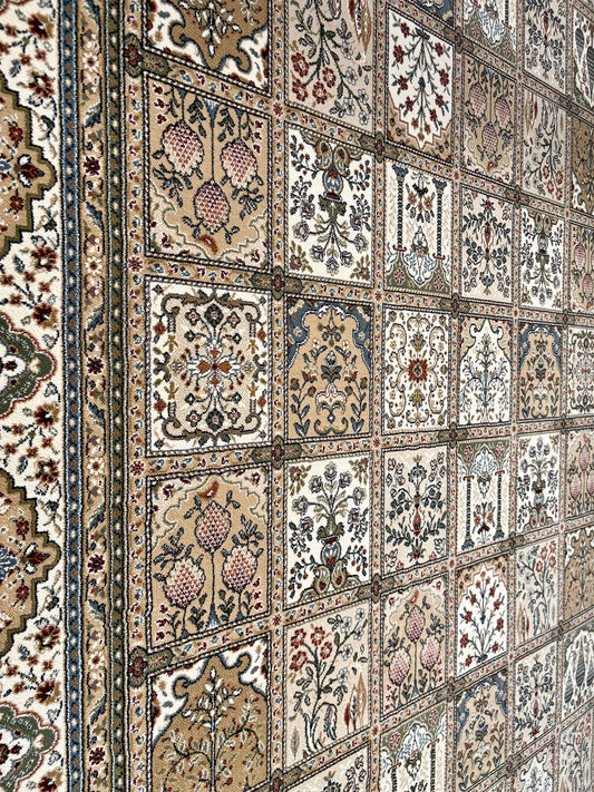 Davinci Bakhtiari Light Persian Rug. Machine made and specially crafted with heat-set polypropylene for long-lasting durability. Featuring a traditional Persian design. Colours, beige/multi. 3 sizes. Close Angle.
