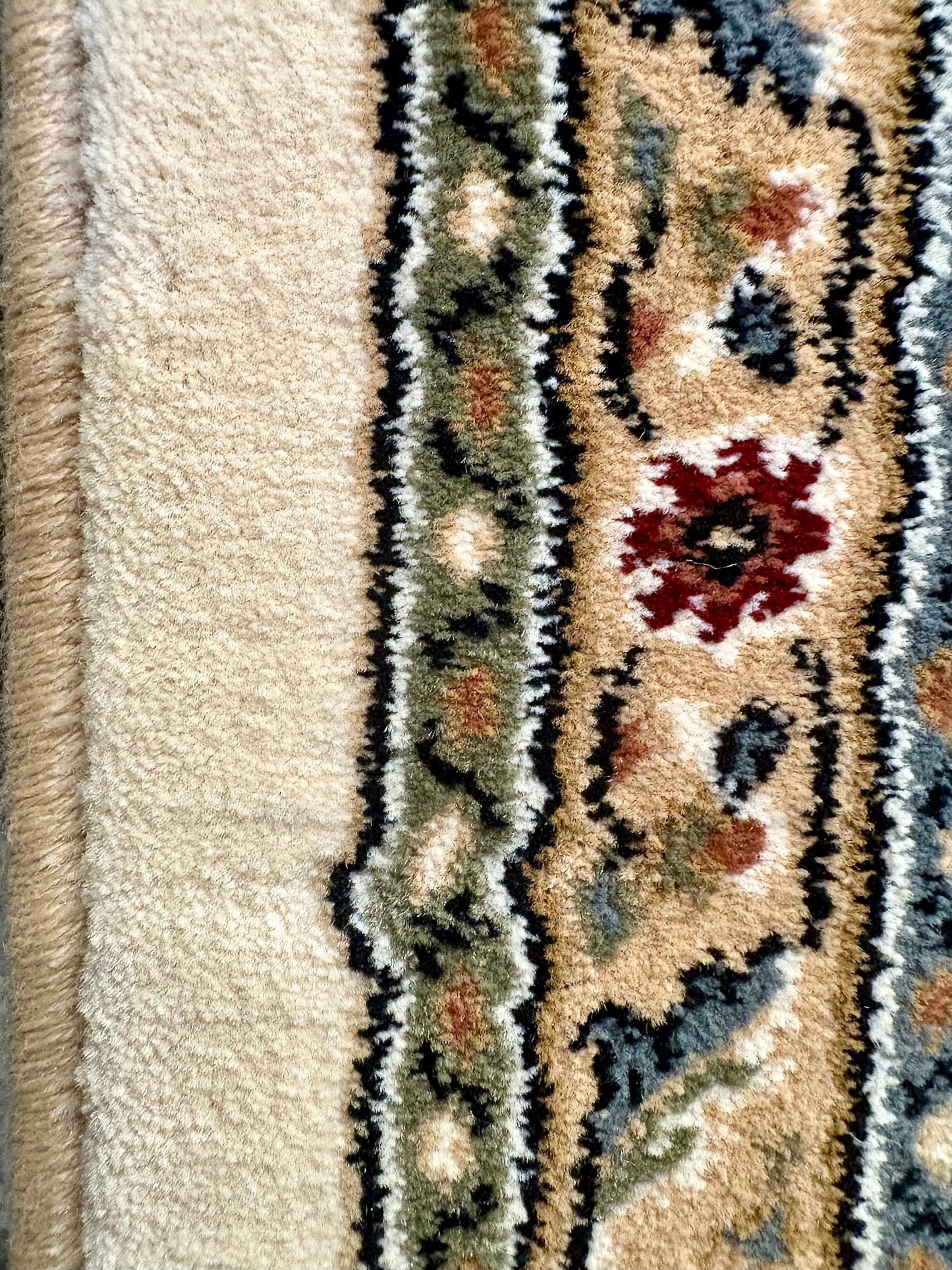 Davinci Bakhtiari Light Persian Rug. Machine made and specially crafted with heat-set polypropylene for long-lasting durability. Featuring a traditional Persian design. Colours, beige/multi. 3 sizes. Side Close.