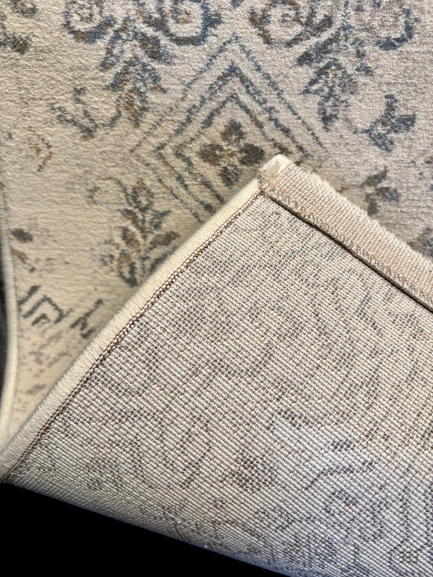 The Davinci Caucasian Silver Persian Rug. Featuring a traditional Persian design this machine made rug is constructed with heat-set polypropylene. Colours light beige with grey accents. 3 Sizes. Fold.