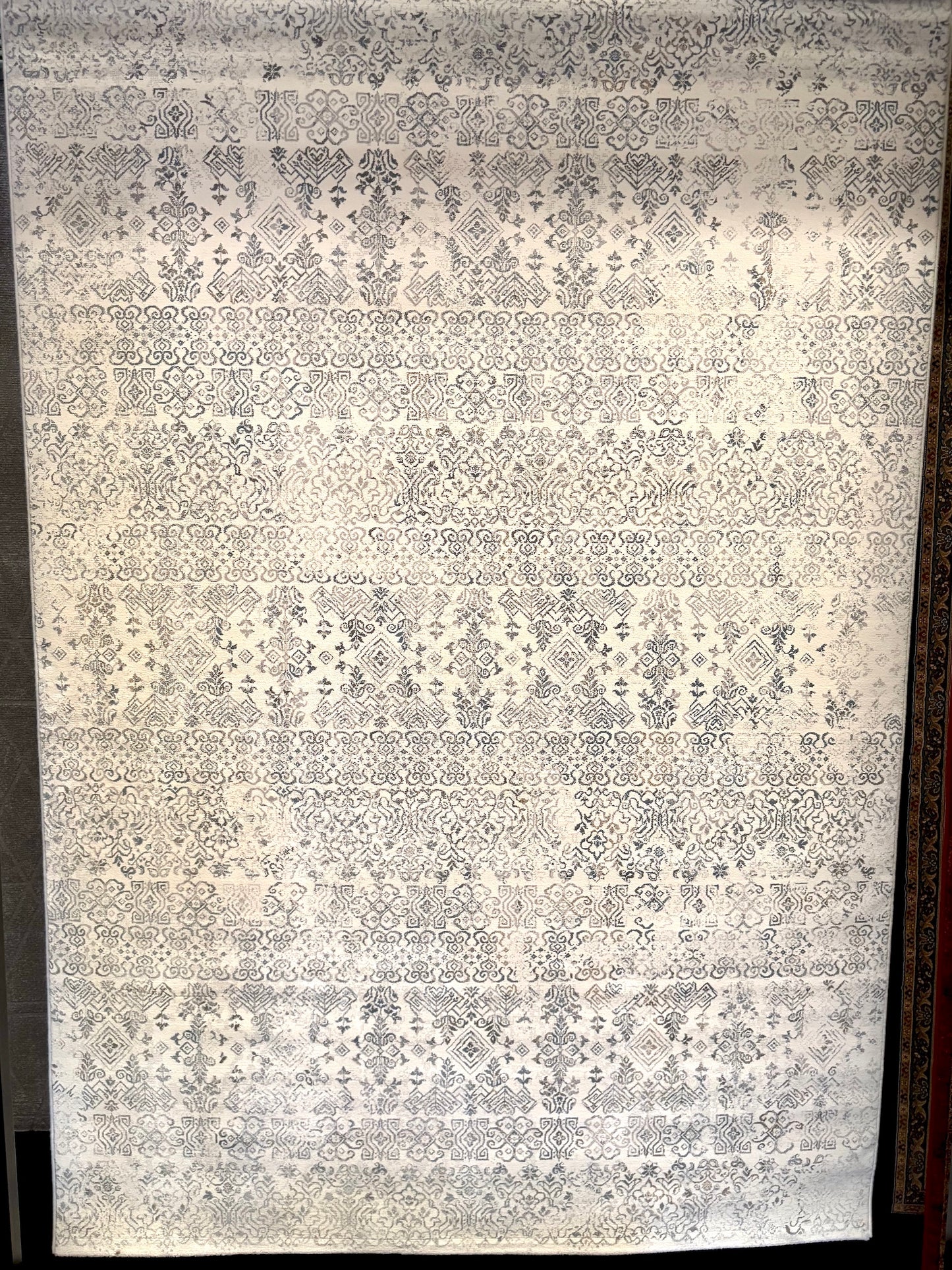 The Davinci Caucasian Silver Persian Rug. Featuring a traditional Persian design this machine made rug is constructed with heat-set polypropylene. Colours light beige with grey accents. 3 Sizes. Full.