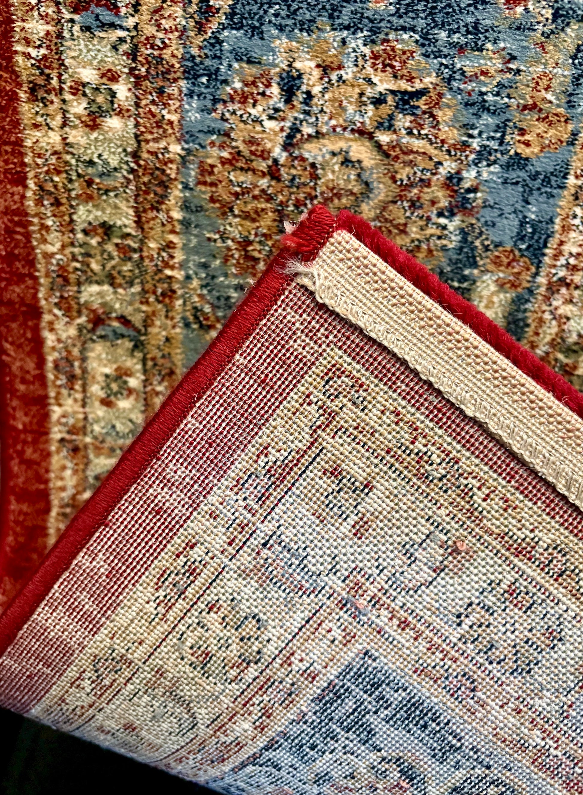 The Davinci Heriz Red Persian Rug. Machine made and crafted from durable heat-set polypropylene. The classic  Persian design will elevate your home decor. Colours, reds, blues, beiges. 4 Sizes. Fold.