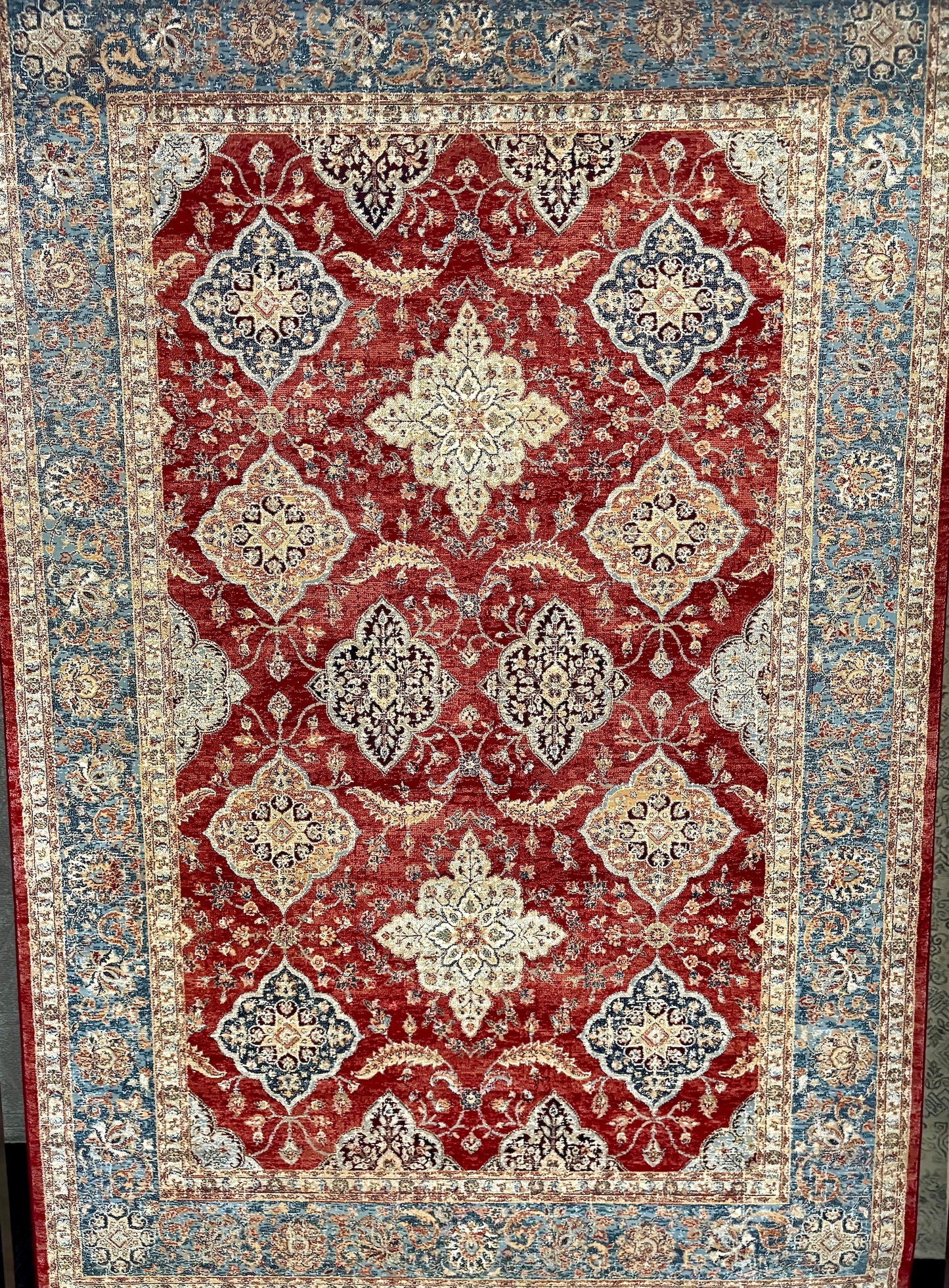 The Davinci Heriz Red Persian Rug. Machine made and crafted from durable heat-set polypropylene. The classic  Persian design will elevate your home decor. Colours, reds, blues, beiges. 4 Sizes. Full.
