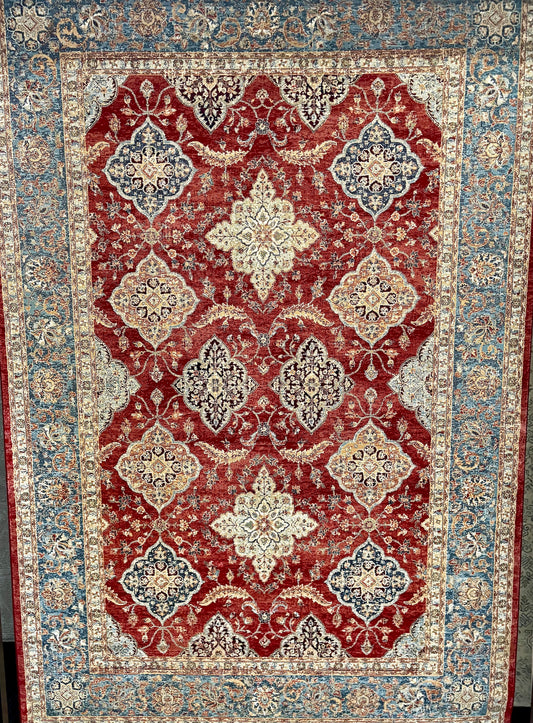 The Davinci Heriz Red Persian Rug. Machine made and crafted from durable heat-set polypropylene. The classic  Persian design will elevate your home decor. Colours, reds, blues, beiges. 4 Sizes. Full.